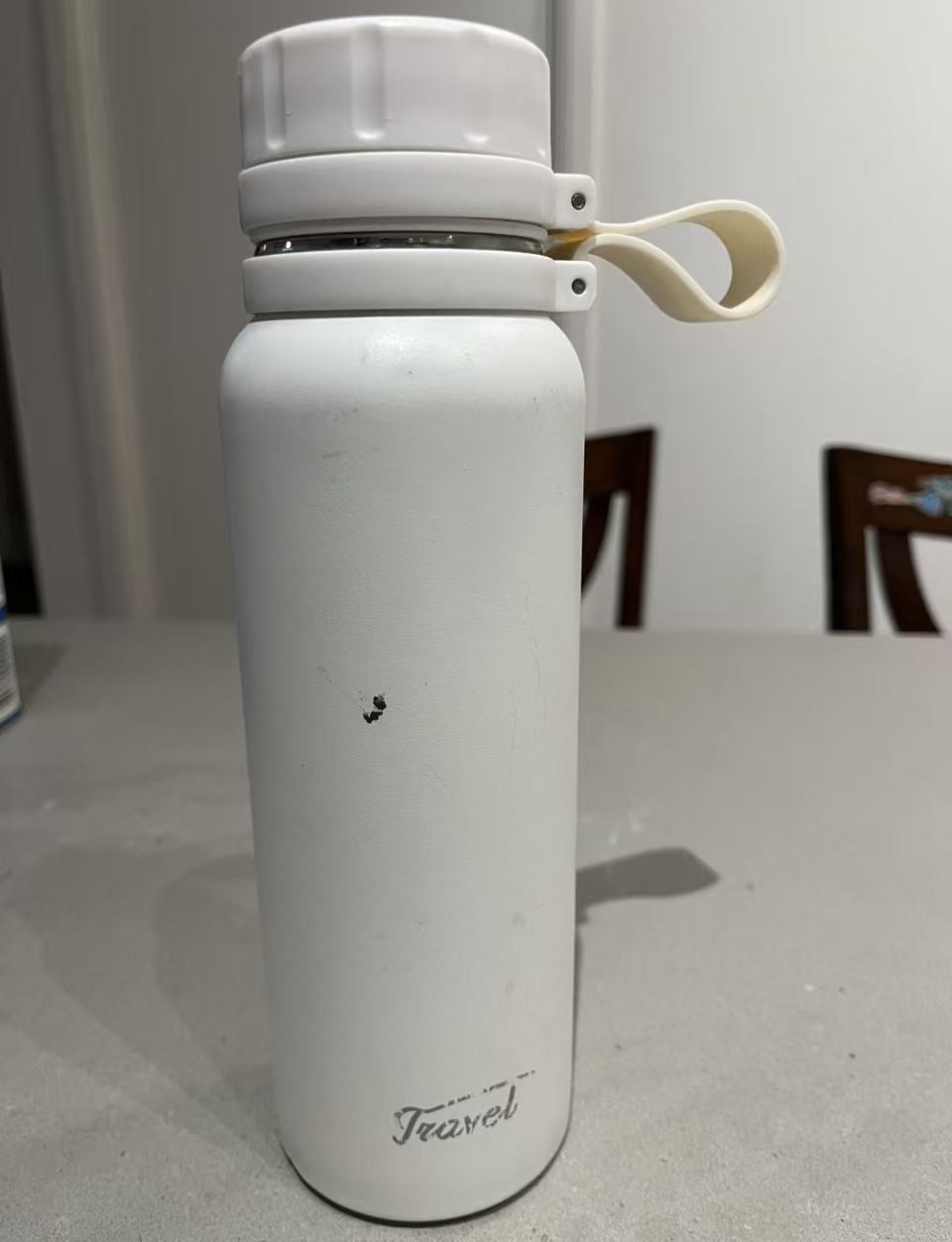 Side view showing the bottle shape